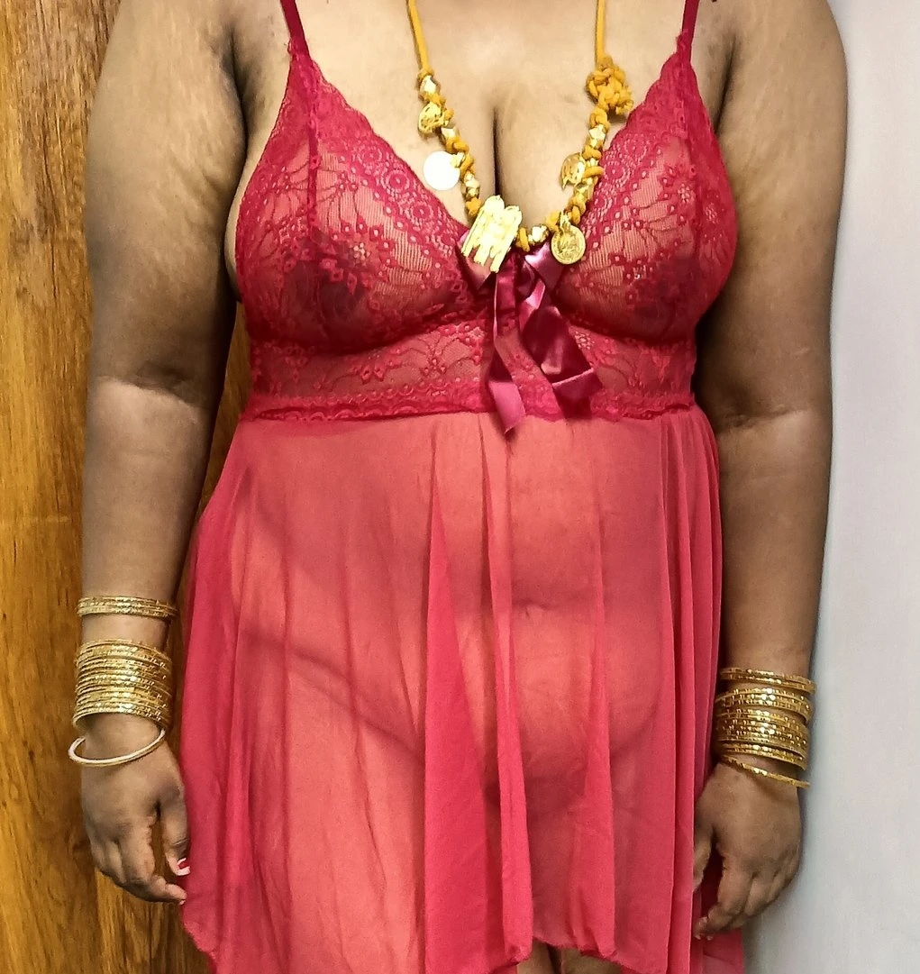 Uninhibited Desi wife in mangalsutra shows her big boobs and naked pussy inside a red lingerie