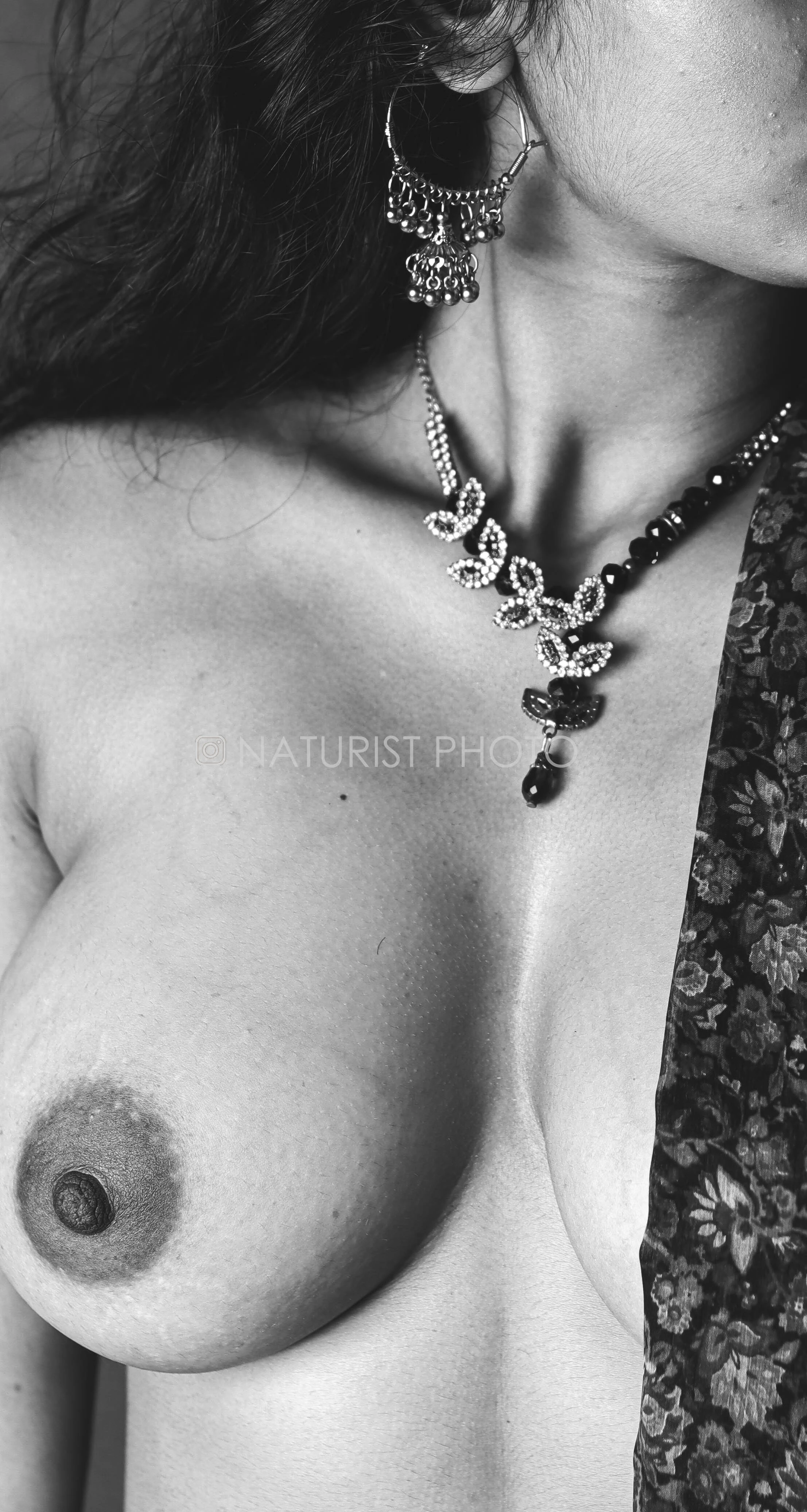 Passionate topless Desi MILF takes you on a wild ride by showing one of her beautiful boobs