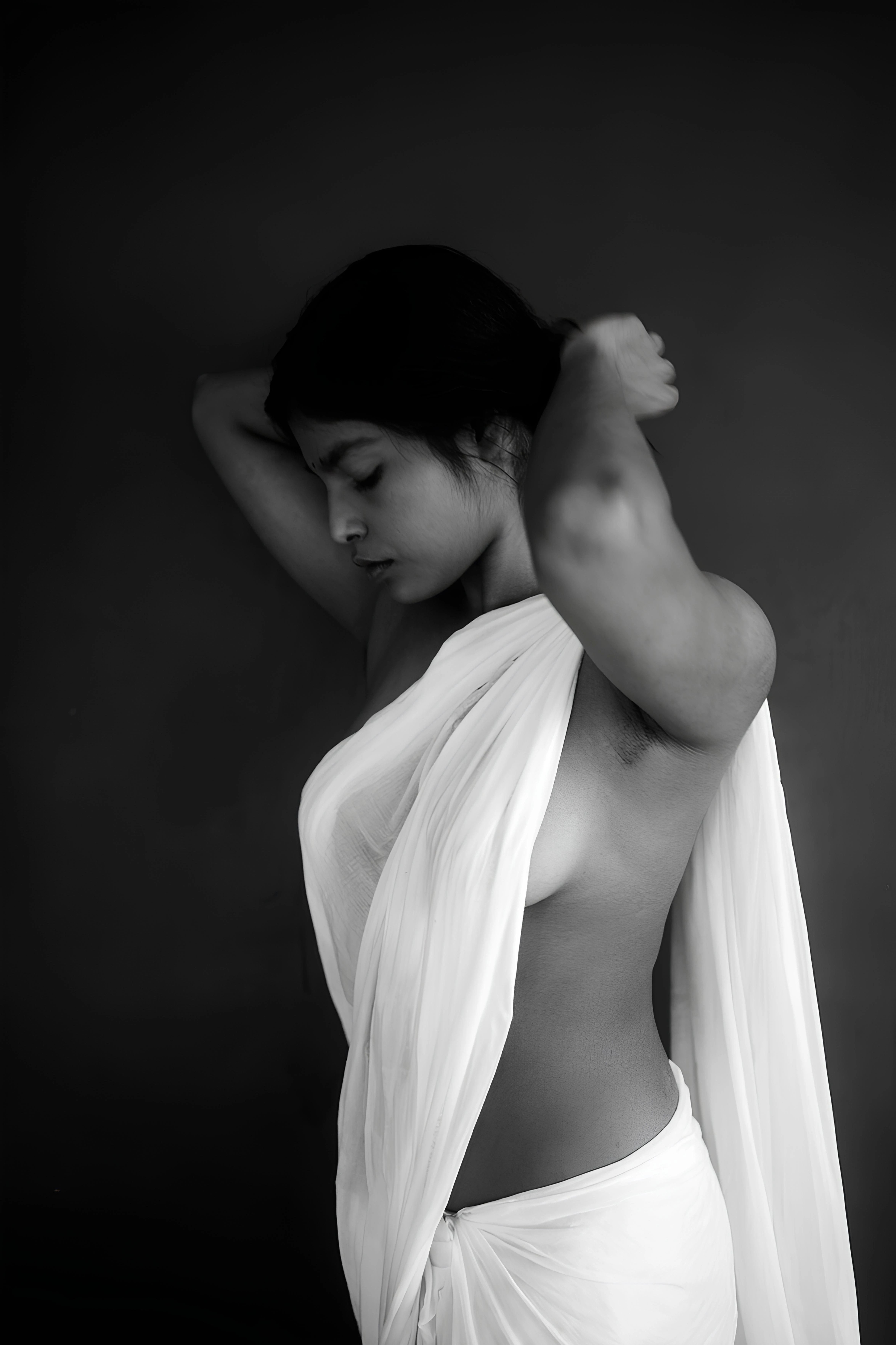 Monochrome topless Desi beauty with braless white saree exposing side boobs of her natural C-cup breast