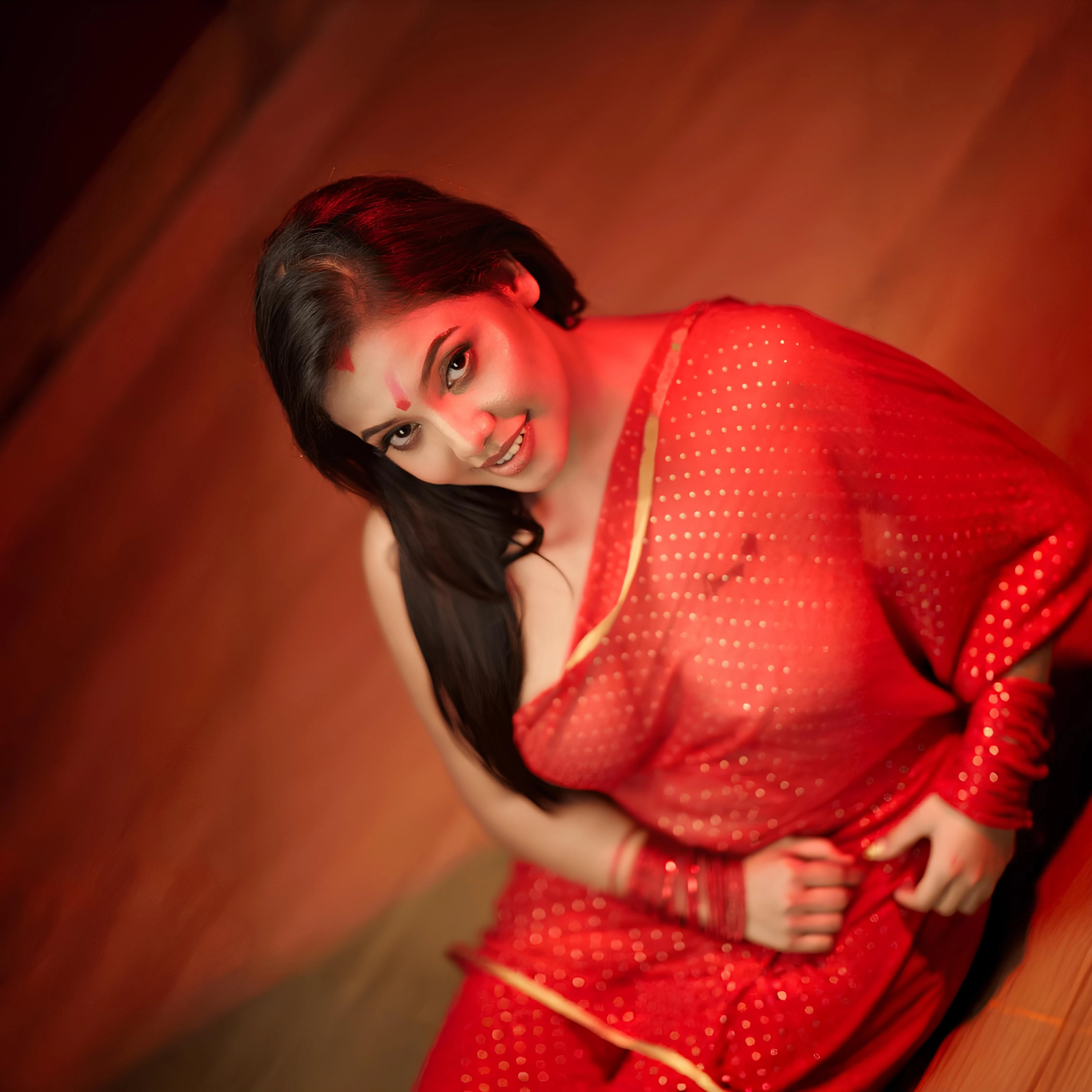 Desi beauty Barsha Sen in a braless red polka dot sari displaying the clear shape of her bare heavy breasts beneath sheer silk fabric